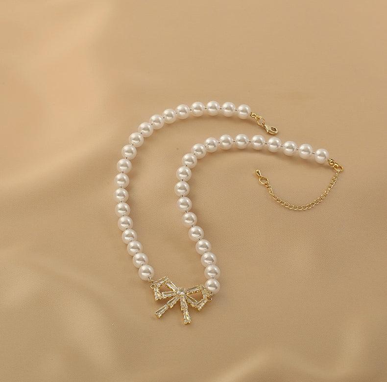 Ladies Lux Fake Pearl Bowknot Necklace SKAJ015 - SWEETKAMA